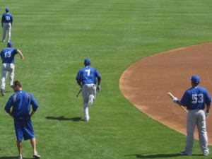 Jose Reyes (No. 7) and Melky Cabrera (53), two ballplayers with history in New York, loosen up pre-game. A controversial call on what was a good Reyes defensive attempt may have cost the Yankees a run.