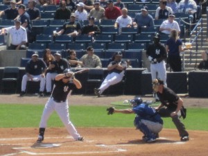 Juan Rivera batting with two outs in the fourth inning. He is about to single, but a bad call following his leadoff double in the second would blunt the best Yankee scoring chance of the day.